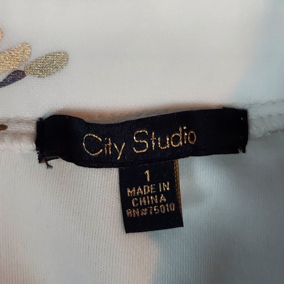 NWOT CITY STUDIO FOIL PRINT FLORAL MINI SKIRT (1 JR.) - Picture 5 of 8